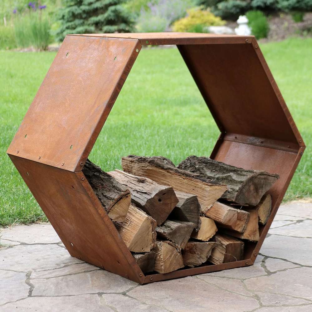 A rusted steel firewood holder stacked with logs